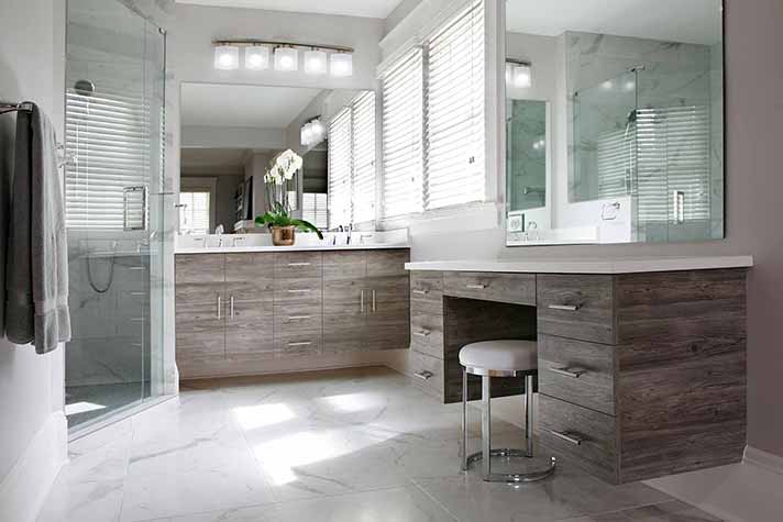 remodeled bathroom with floating vanities