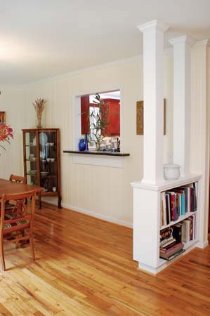 Built-in bookcase separates living room from home
